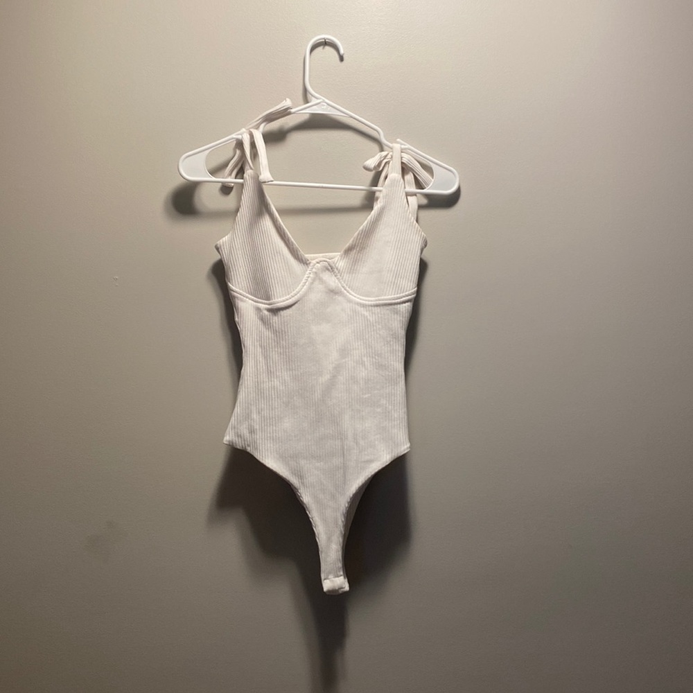 Petal and pup white body suit.